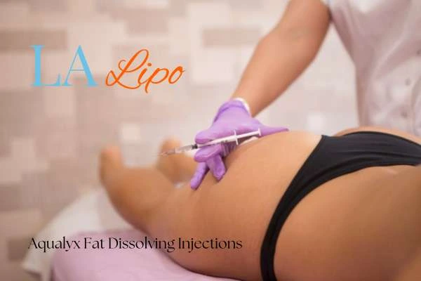 Woman having fat dissolving injections Reading on thighs